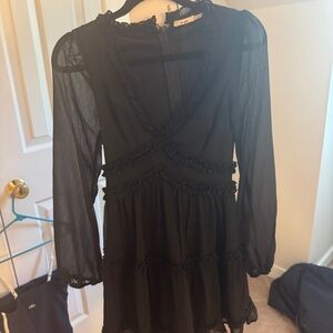 black mi ami mini dress with v neck and ruffle detail!!